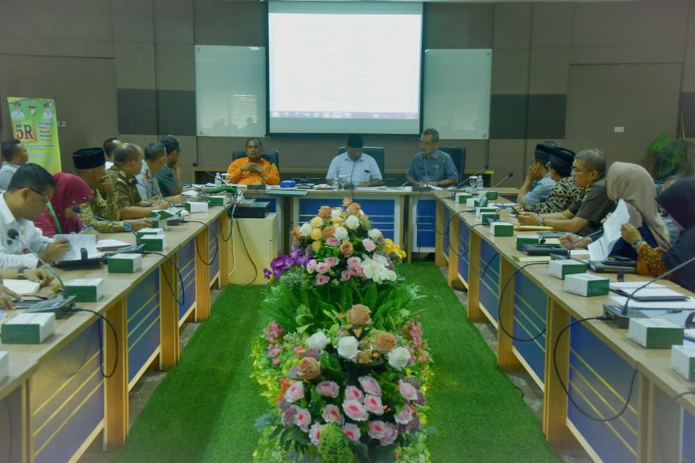 Dengan Penobatan Payung Panji Adat Kabupaten Kampar dan Nikah Massal.
