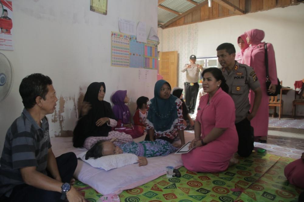 Kapolres Rohul Kunker ke Kecamatan Kepenuhan dan berisantunan Fakir Miskin.