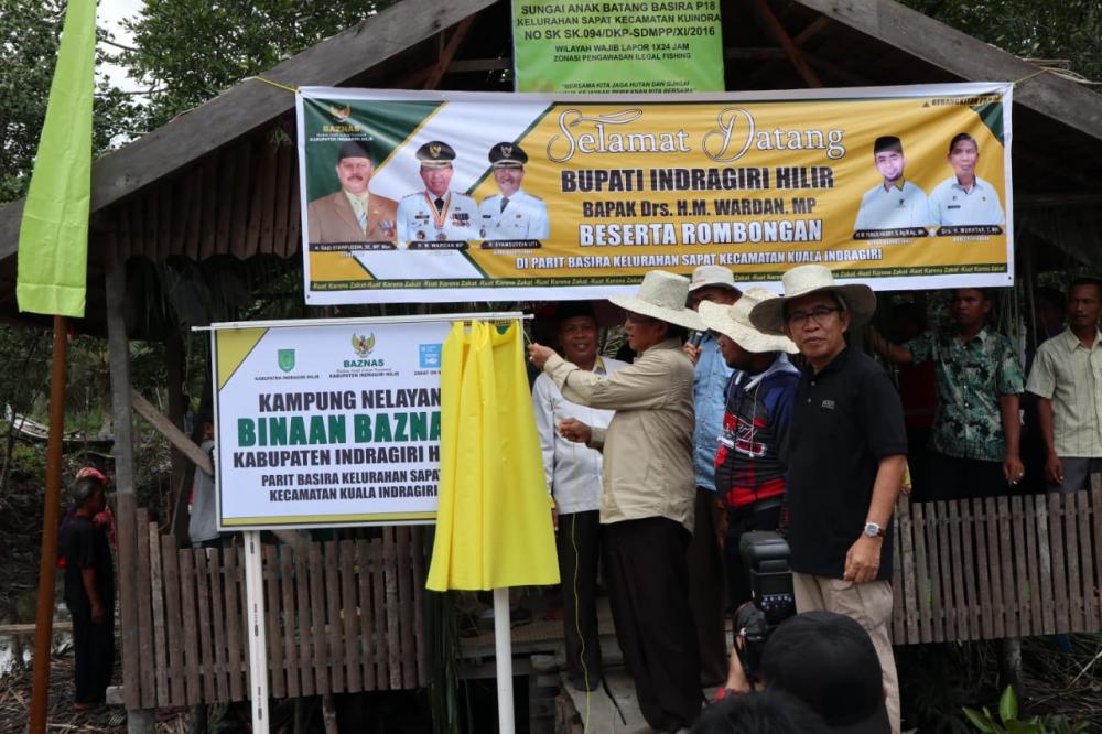 Bupati HM Wardan Resmikan Kampung Nelayan di Parit Basirah, Sapat