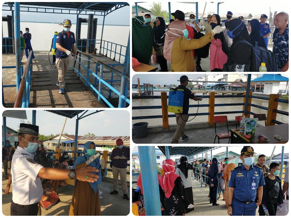 Antisipasi Covid-19, Kepala Syahbandar Pelabuhan Kuala Kampar lakukan Pengukuran Suhu Tubuh Penumpang dan Penyemprotan Desinfektan