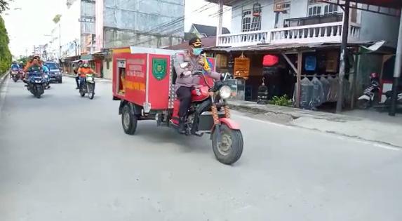Kapolres Inhil AKBP Indra Duaman Pakai Viar PSMTI Penyemprotan Disinfektan Antisipasi Virus Corona
