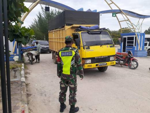 Prajurit TNI Rupat  Gelar Penegakan Disiplin Protokol Kesehatan Bagi Penumpang Roro