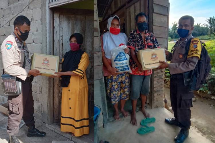 Salurkan Paket Sembako Bantuan Polres Rohil, Polsek Pujud Kerahkan Para Bhabinkamtibmas 