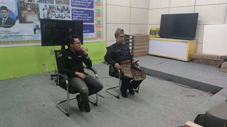 Kadis Kominfopers Inhil Buka Sosialisasi dan Bimtek Simpeldesa 