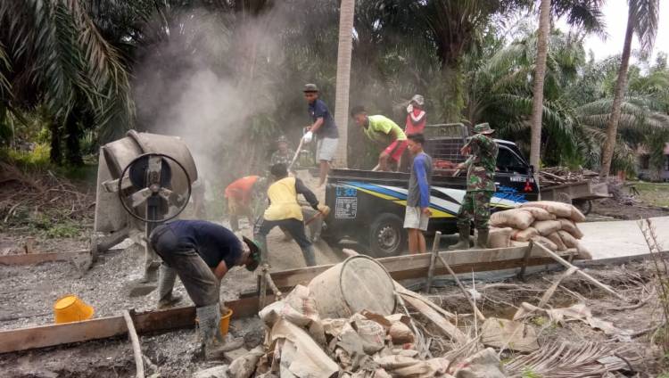 Jalan Parit Medan Api api DibangunKegiatan TMMD  sangat membantu masyarakat , 