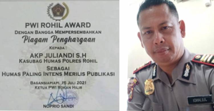 Kasubag Humas Polres Rohil Terima Reward dari PWI