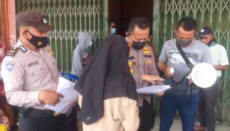 Polsek Tapung Hulu Koordinasi dengan Kades dan Pihak Kantor Pos Cegah Kerumunan saat Pembagian BLT