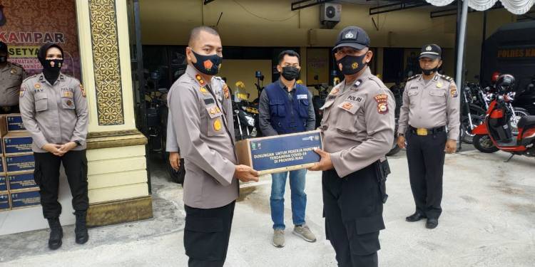 Polres Kampar Distribusikan 455 Paket Sembako dari Kementerian Parawisata RI kepada Masyarakat