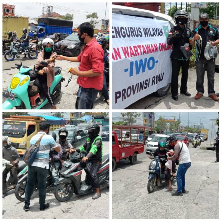 Ikatan Wartawan Online (IWO) Riau Kembali Gelar Kegiatan Bagi-bagi Masker kepada Masyarakat