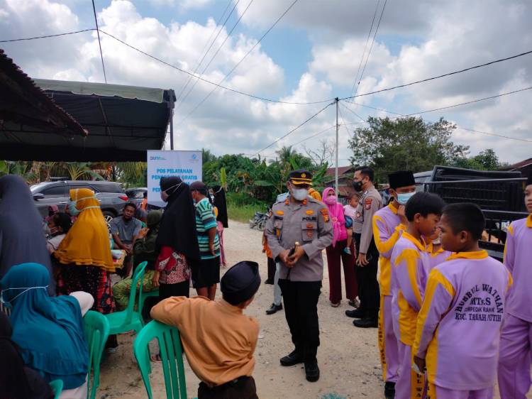 Kapolres Rohil Pantau Vaksinasi Massal di Pasar Cempedak Rahuk
