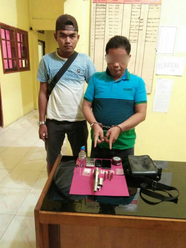 Astaga!!! Dari Tangan Diduga Pengedar Sabu Ini, Sat Res Narkoba Polres Rohil Amankan Sepucuk Pistol