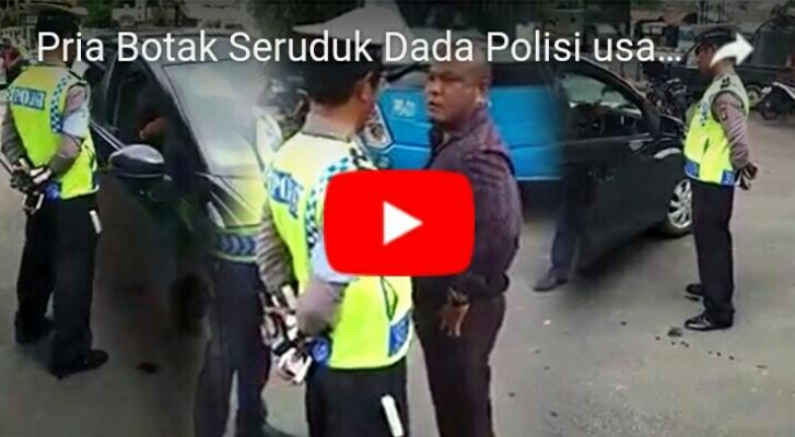 Video Pria Botak Seruduk Dada Polisi usai Nekat Terobos Jalur Telarang