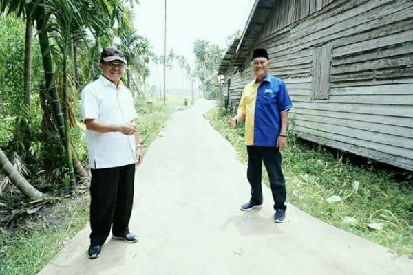 H Syamsuddin Uti=  Sepenggal Kisah Komitmen Membangun Negeri Bersama  Sang Petahana