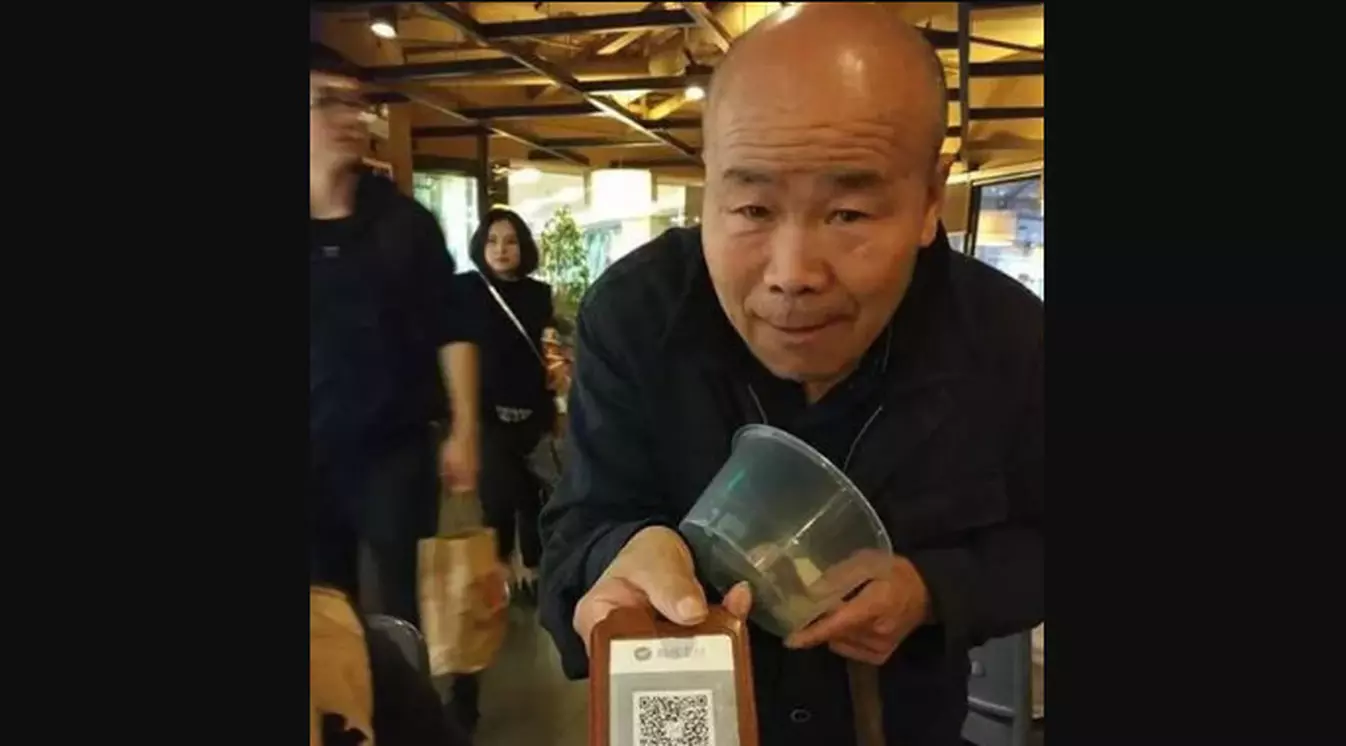 Pengemis di Tiongkok Kini Bisa Terima Uang Dengan Code QR