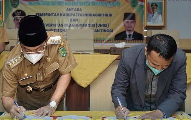 Bupati Inhil HM. Wardan Tandatangani MoU Kerja Sama dengan Unisi