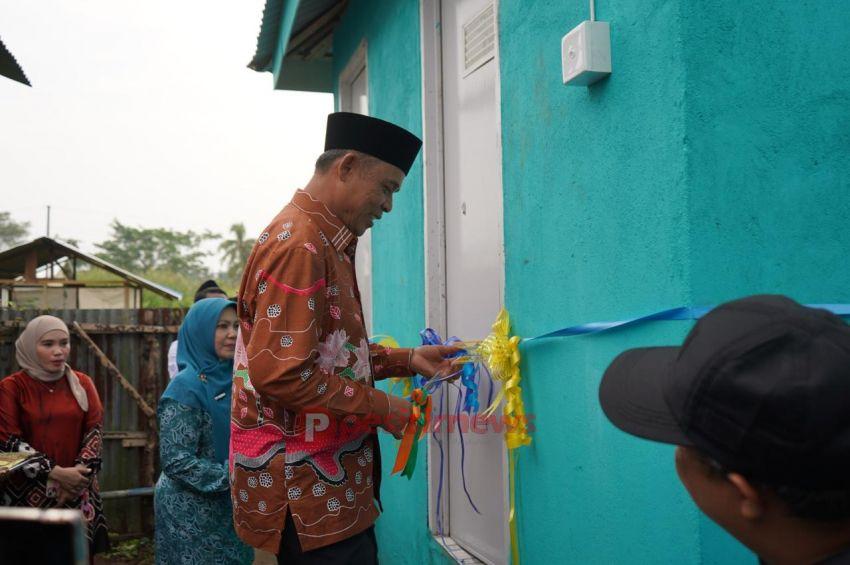 Milad Ke-61 Inhil, Bupati Herman Hadirkan Jamban Sehat Percontohan di Ponpes Daarul Rahman